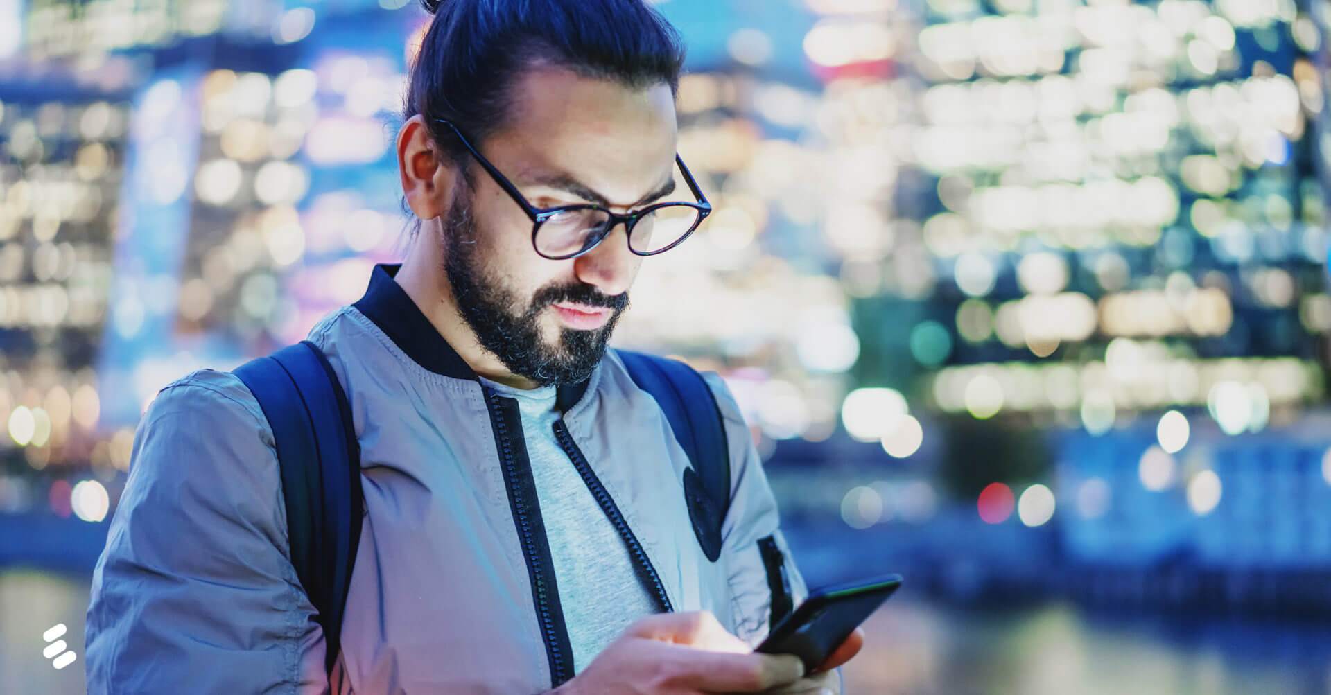 A customer using a smartphone in an outdoor setting.