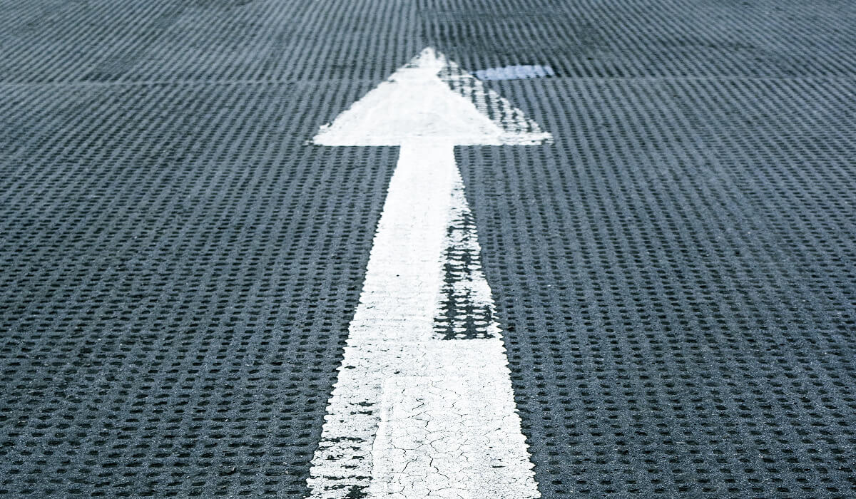 An arrow pointing upward.