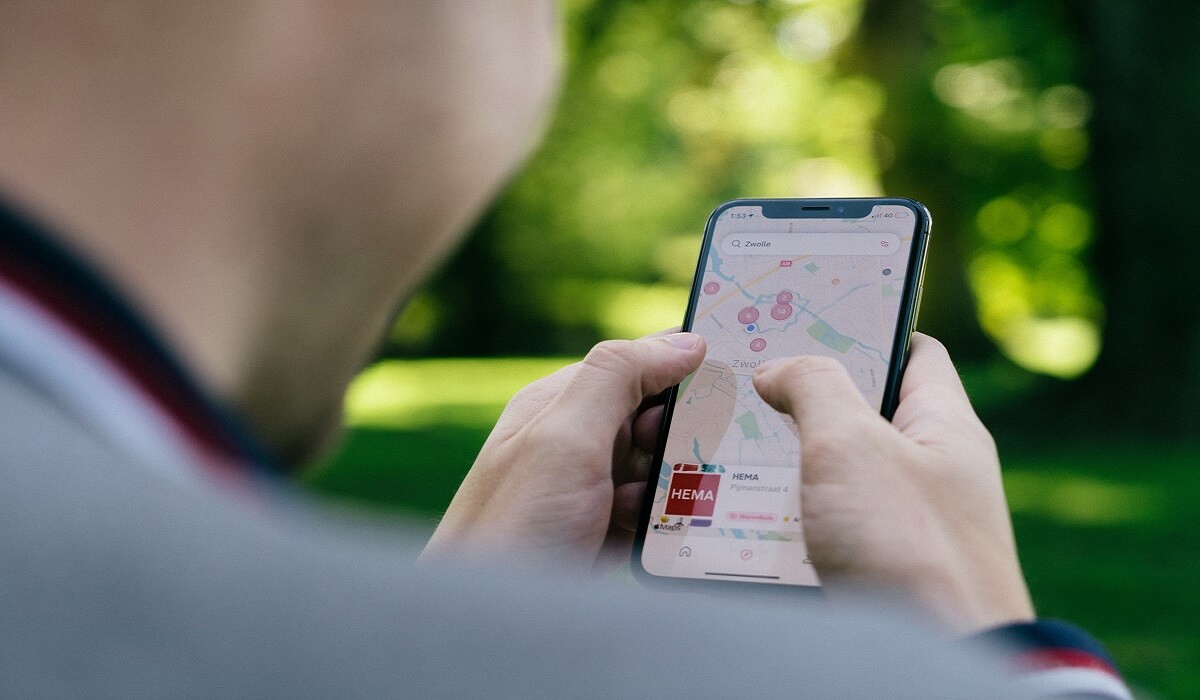 A person using Google Maps on a smartphone.